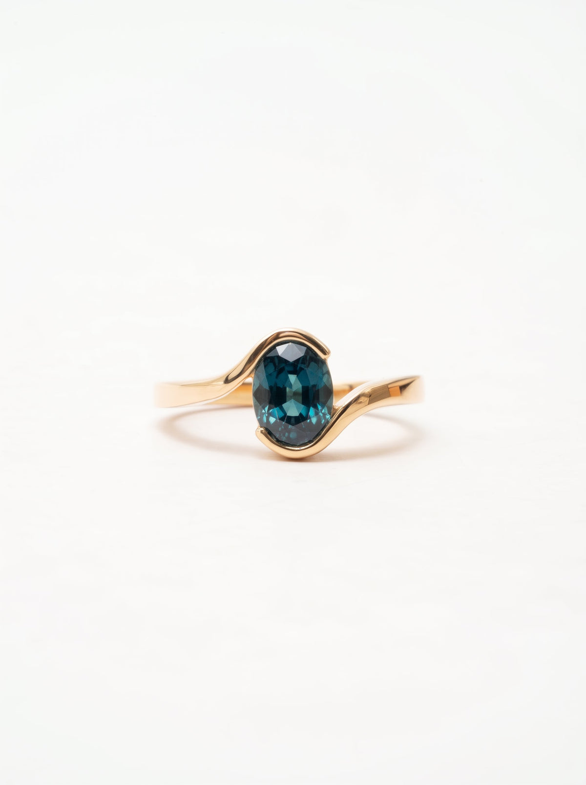 Oval Teal Sapphire Bezel Bypass Engagement Ring — front